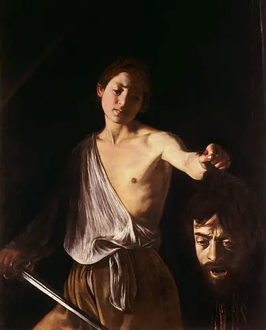 Caravaggio - David tinand capul lui Goliat (1605-1610)